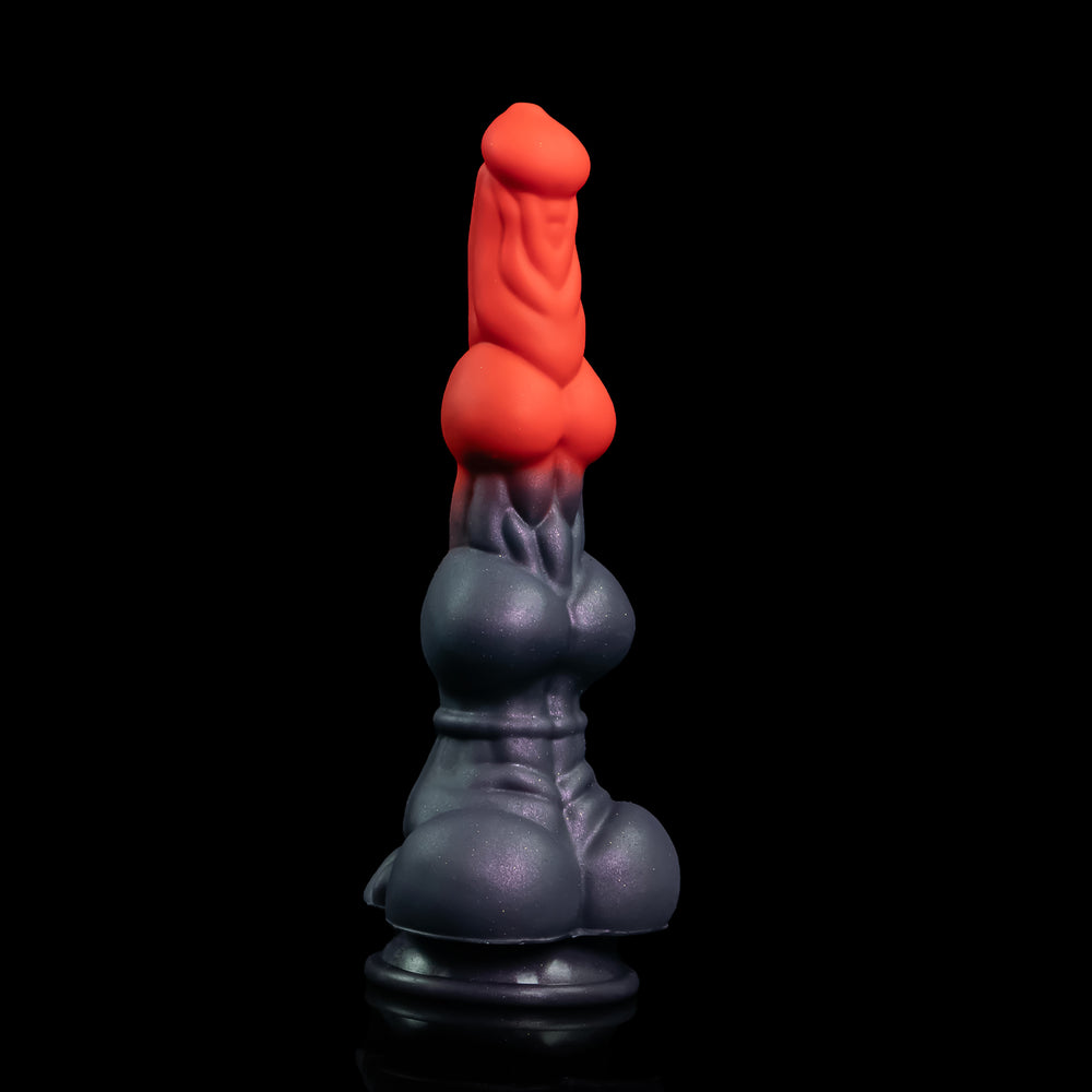 Kelvuro double-knot fantasy dildo upright, with a red upper body and deep-purple sculpted base