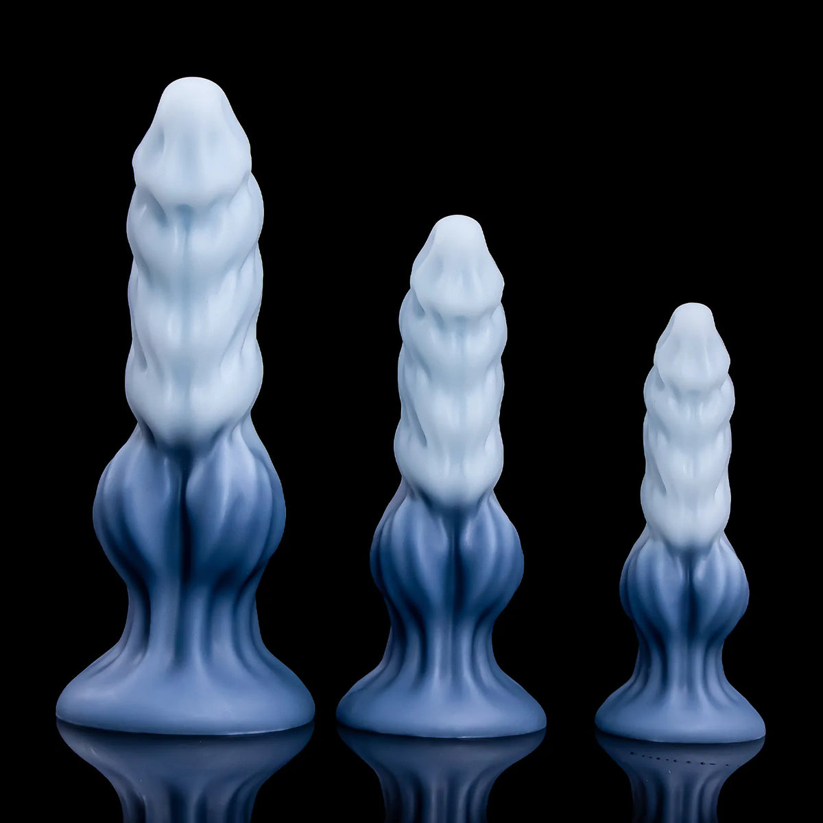 Three differently sized Nivaskel forms standing side by side with matching pale and deep-blue coloring.