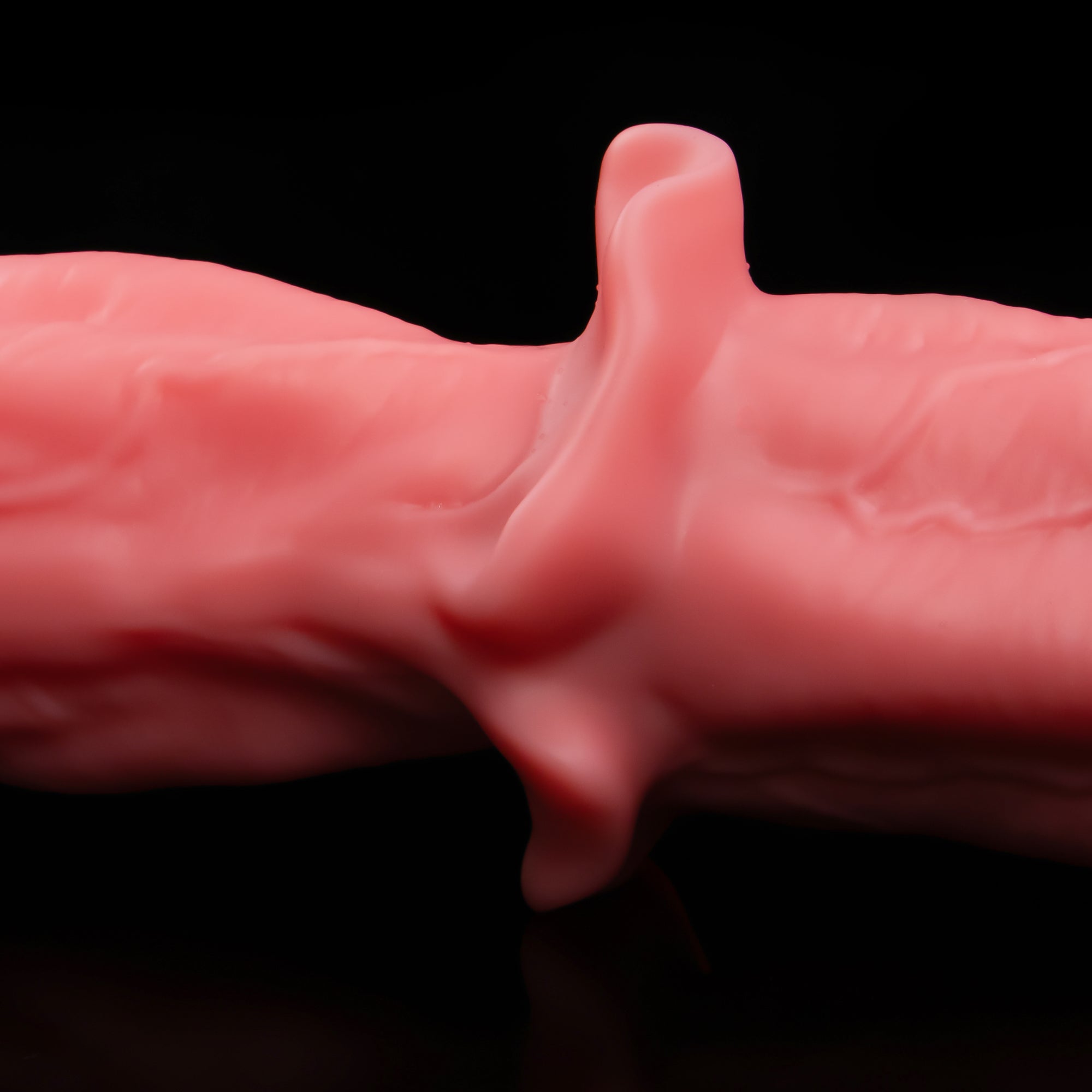 Side detail of Bellmantle's projecting collar and vein-like shaft relief